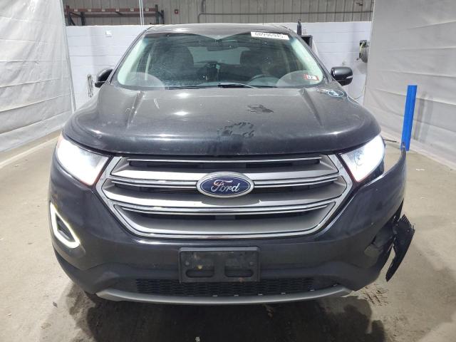 Photo 5 from auction – 2015 FORD EDGE TITAN with VIN 2FMTK4K84FBB42811