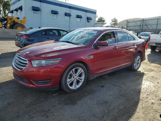FORD TAURUS SEL 2016 with VIN 1FAHP2E8XGG138984 - Photo from auction
