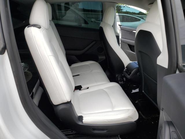 Photo 10 from auction – 2023 TESLA MODEL Y with VIN 7SAYGAEE0PF641124