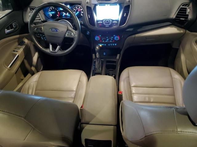 Photo 8 from auction – 2017 FORD ESCAPE TITANIUM with VIN 1FMCU9J92HUA64401
