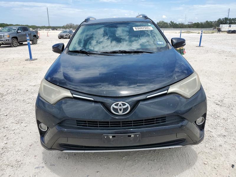 Photo 5 from auction – 2016 TOYOTA RAV4 XLE with VIN 2T3WFREV3GW311946