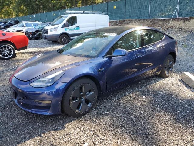 TESLA MODEL 3 2021 with VIN 5YJ3E1EAXMF939430 - Photo from auction