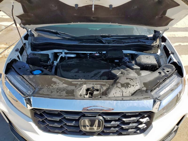 Photo 12 from auction – 2023 HONDA PASSPORT E with VIN 5FNYF8H56PB009006
