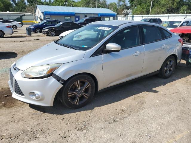FORD FOCUS SE 2014 with VIN 1FADP3F20EL109867 - Photo from auction