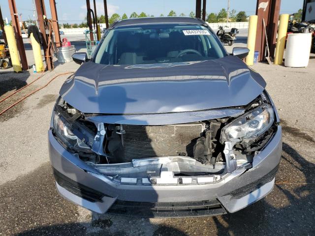 Photo 5 from auction – 2018 HONDA CIVIC LX with VIN 19XFC2F53JE021286