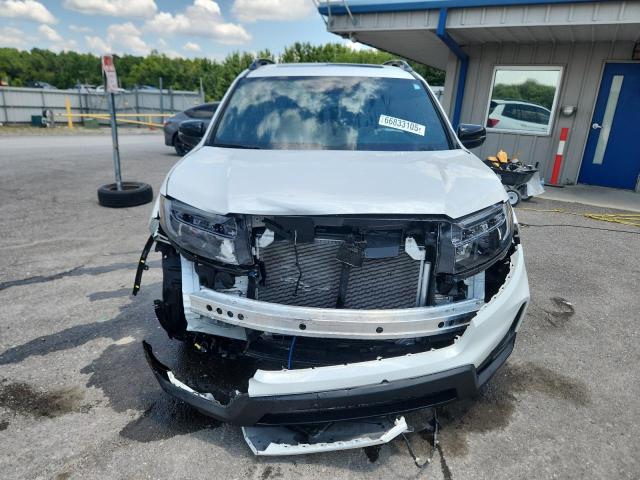 Photo 5 from auction – 2023 HONDA PASSPORT E with VIN 5FNYF8H05PB037156