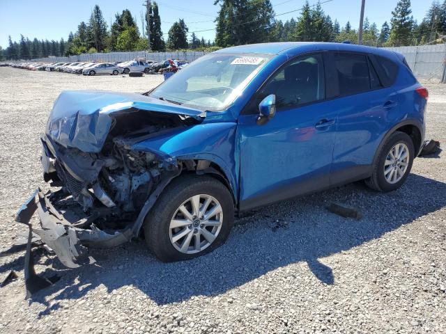 MAZDA CX-5 TOURI 2014 with VIN JM3KE2CY4E0379929 - Photo from auction