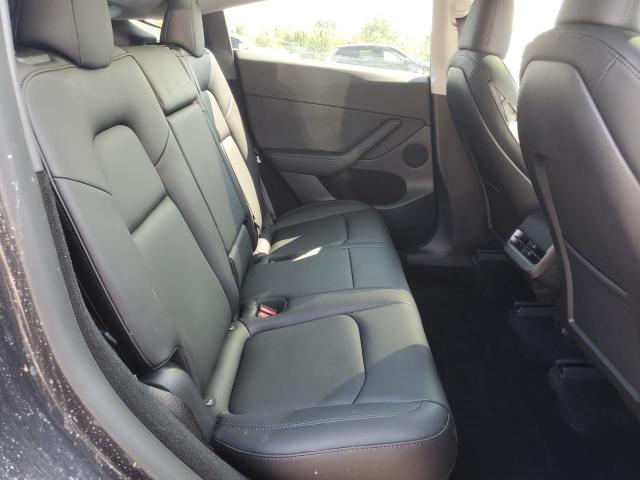 Photo 11 from auction – 2024 TESLA MODEL Y with VIN 7SAYGDEEXRF129651