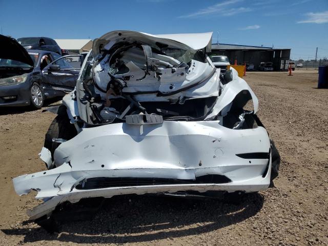 Photo 5 from auction – 2021 TESLA MODEL 3 with VIN 5YJ3E1EC6MF076644