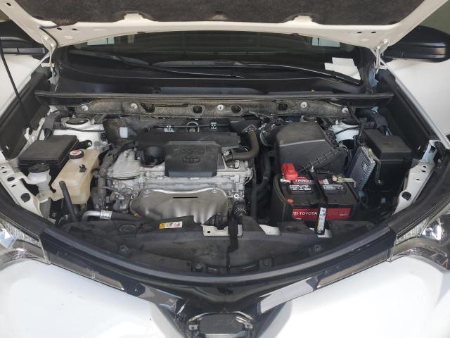 Photo 11 from auction – 2018 TOYOTA RAV4 LE with VIN JTMBFREV1JD250261
