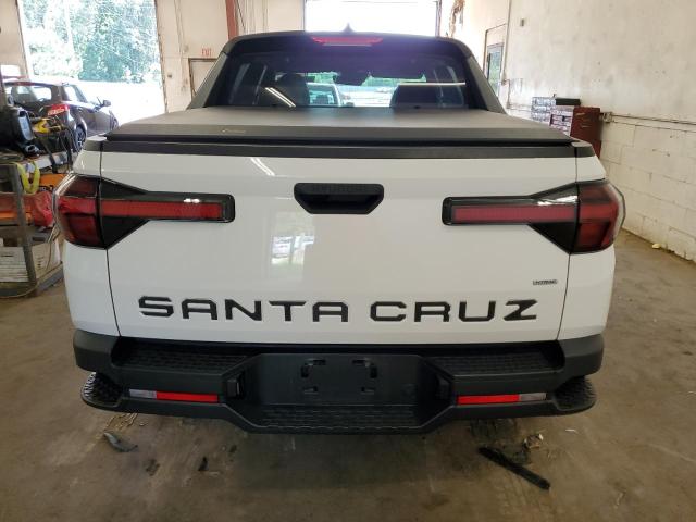 Photo 6 from auction – 2022 HYUNDAI SANTA CRUZ with VIN 5NTJADAE2NH010656