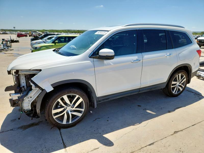 Photo 1 from auction – 2017 HONDA PILOT TOUR with VIN 5FNYF5H91HB029652
