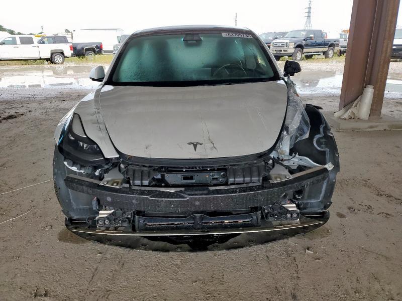 Photo 5 from auction – 2022 TESLA MODEL 3 with VIN 5YJ3E1EA3NF120809