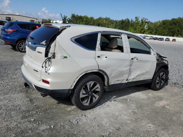 Photo 3 from auction – 2016 HONDA CR-V TOURI with VIN 5J6RM4H91GL014529