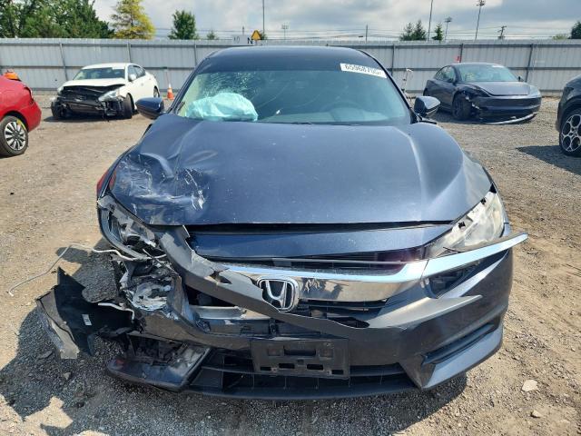 Photo 5 from auction – 2017 HONDA CIVIC LX with VIN 2HGFC2F58HH556811