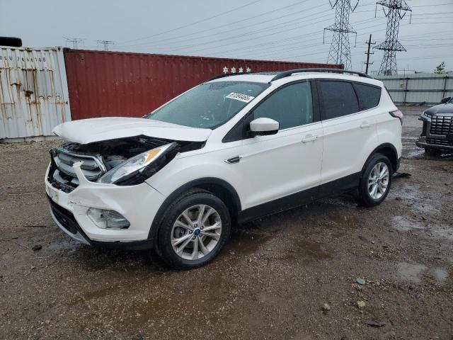 FORD ESCAPE SE 2018 with VIN 1FMCU9GD1JUB98950 - Photo from auction