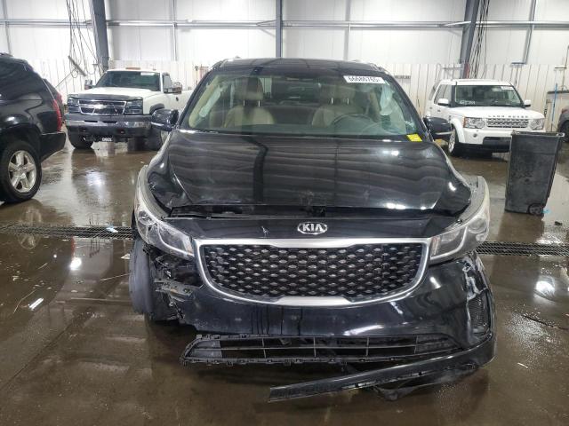 Photo 5 from auction – 2015 KIA SEDONA LX with VIN KNDMB5C13F6040611