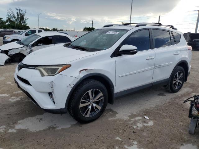 TOYOTA RAV4 XLE 2017 with VIN 2T3WFREV5HW337126 - Photo from auction