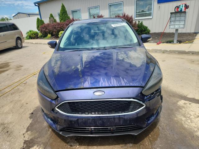Photo 5 from auction – 2016 FORD FOCUS SE with VIN 1FADP3F21GL330090