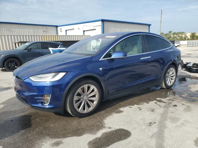 TESLA MODEL X 2020 with VIN 5YJXCDE20LF297896 - Photo from auction