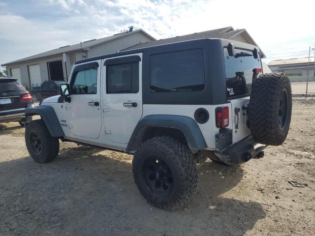 Photo 2 from auction – 2014 JEEP WRANGLER U with VIN 1C4BJWDG0EL119852