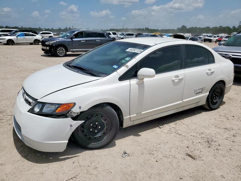 HONDA CIVIC LX 2009 with VIN 19XFA16569E010035 - Photo from auction
