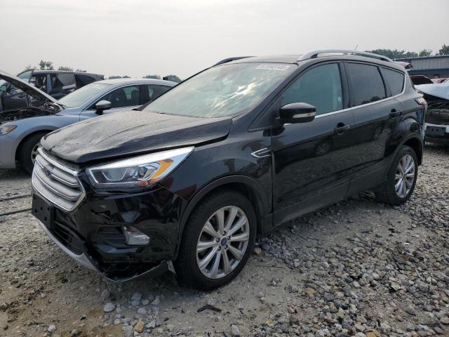 FORD ESCAPE TIT 2017 with VIN 1FMCU9J91HUD21516 - Photo from auction