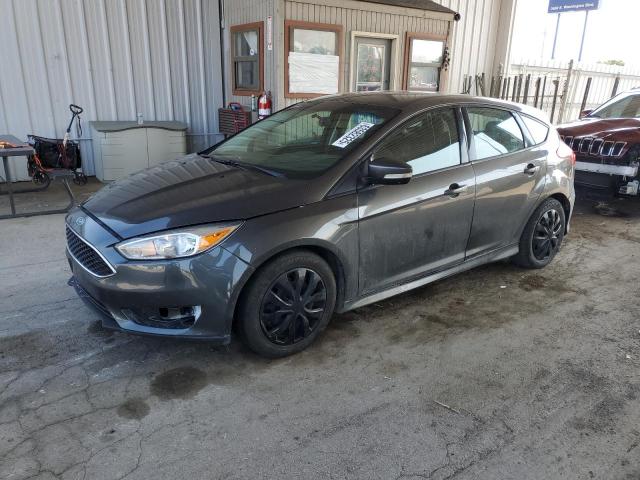 FORD FOCUS SE 2015 with VIN 1FADP3K20FL371282 - Photo from auction