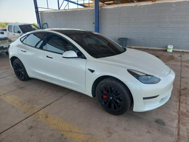 Photo 4 from auction – 2021 TESLA MODEL 3 with VIN 5YJ3E1EA5MF032360