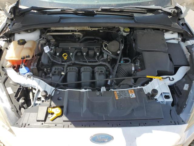 Photo 11 from auction – 2015 FORD FOCUS SE with VIN 1FADP3F20FL224583