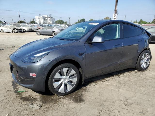 TESLA MODEL Y 2023 with VIN 7SAYGDEE8PF903067 - Photo from auction