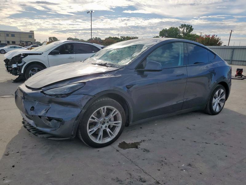 TESLA MODEL Y 2023 with VIN 7SAYGAEE8PF894014 - Photo from auction