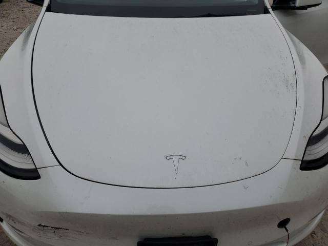 Photo 11 from auction – 2021 TESLA MODEL Y with VIN 5YJYGAEE2MF256480