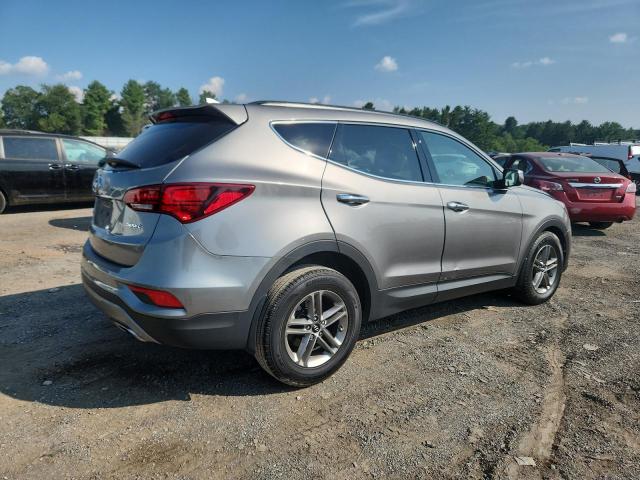 Photo 3 from auction – 2018 HYUNDAI SANTA FE S with VIN 5NMZU3LB8JH097542