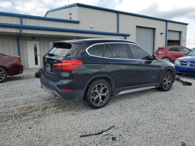 Photo 3 from auction – 2018 BMW X1 XDRIVE2 with VIN WBXHT3C31J5K31403