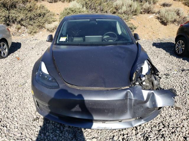 Photo 5 from auction – 2022 TESLA MODEL 3 with VIN 5YJ3E1EB1NF112037