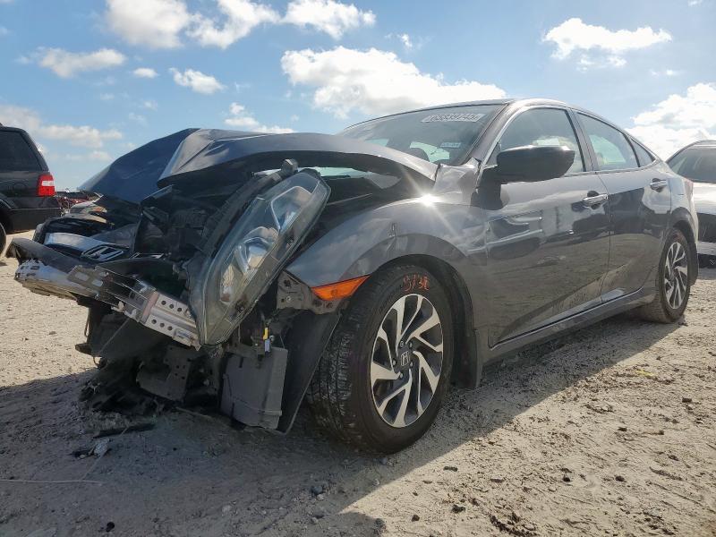 HONDA CIVIC EX 2018 with VIN 2HGFC2F71JH544412 - Photo from auction