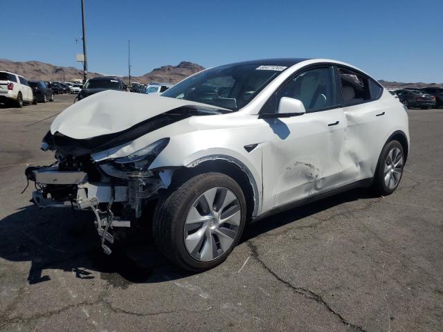 TESLA MODEL Y 2023 with VIN 7SAYGDED9PF942077 - Photo from auction