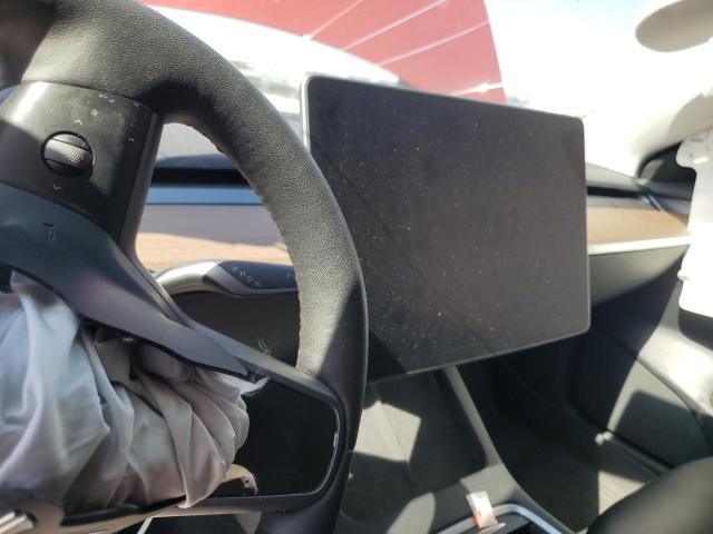 Photo 9 from auction – 2022 TESLA MODEL 3 with VIN 5YJ3E1EB0NF354656