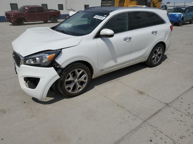 KIA SORENTO SX 2016 with VIN 5XYPKDA10GG017537 - Photo from auction
