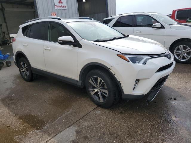 Photo 4 from auction – 2017 TOYOTA RAV4 XLE with VIN JTMWFREV0HD102825