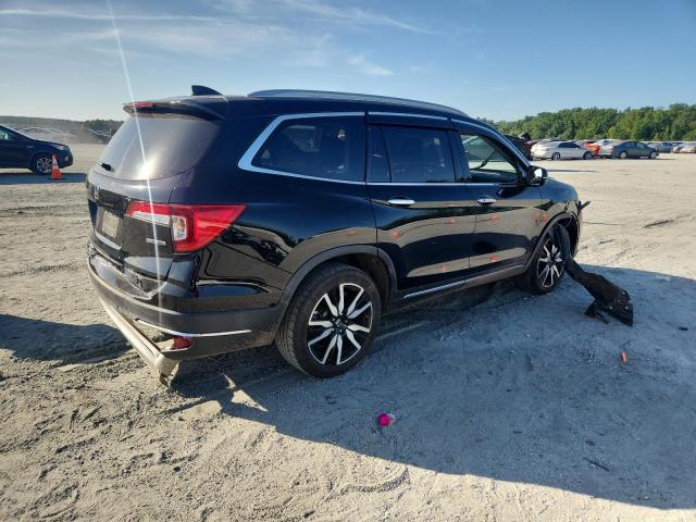Photo 3 from auction – 2019 HONDA PILOT TOUR with VIN 5FNYF5H64KB019887