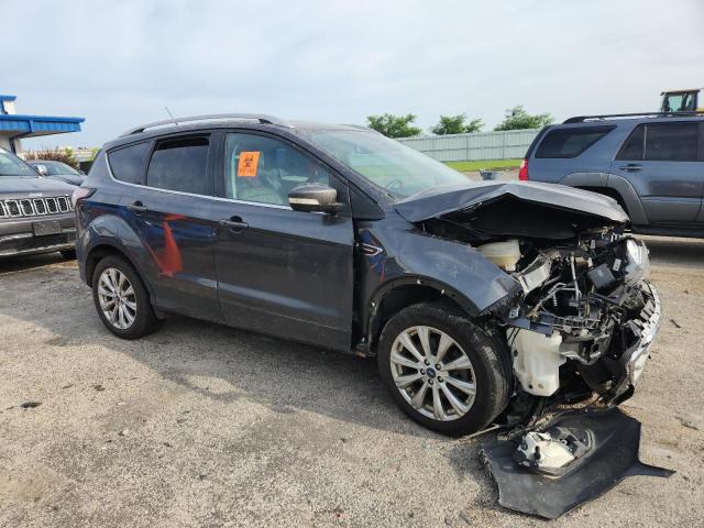 Photo 4 from auction – 2018 FORD ESCAPE TIT with VIN 1FMCU9J96JUC15827