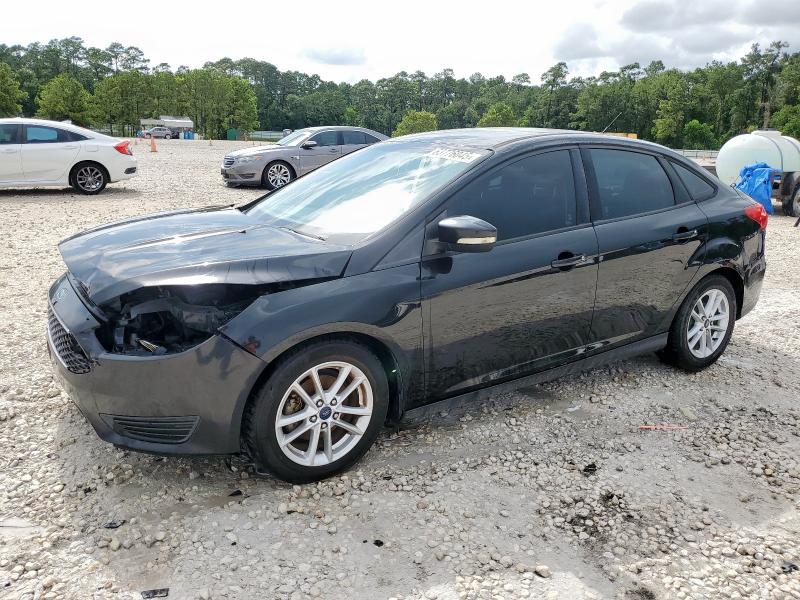 FORD FOCUS SE 2015 with VIN 1FADP3F21FL261013 - Photo from auction