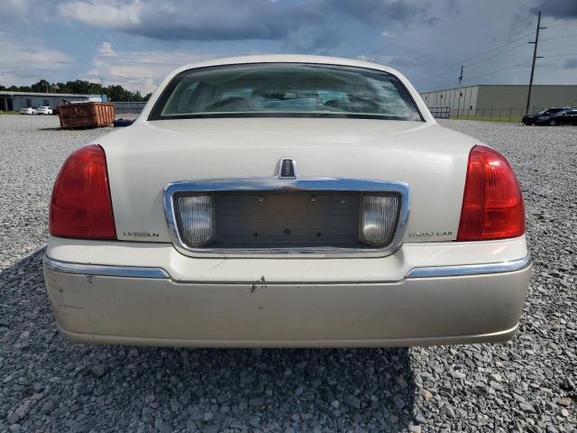 Photo 6 from auction – 2004 LINCOLN TOWN CAR E with VIN 1LNHM81W04Y660213