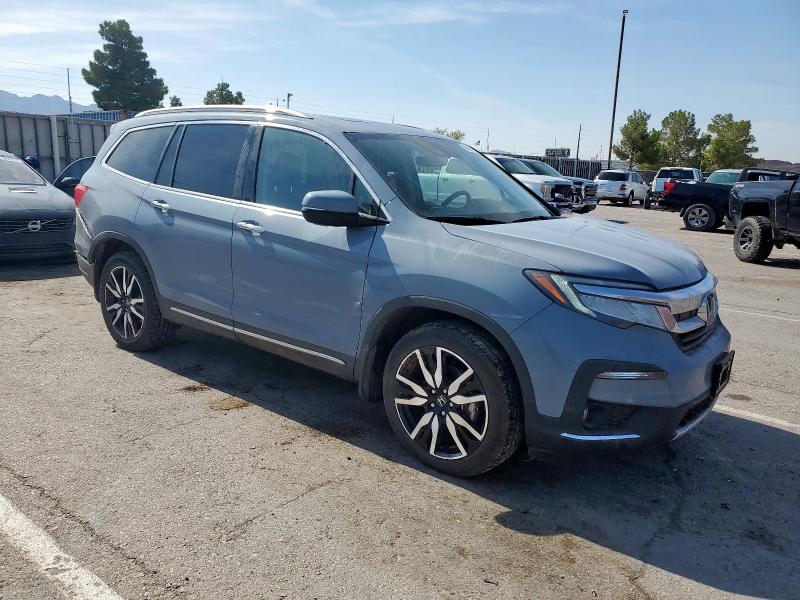 Photo 4 from auction – 2022 HONDA PILOT ELIT with VIN 5FNYF6H08NB040389