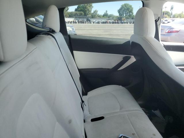 Photo 11 from auction – 2022 TESLA MODEL Y with VIN 7SAYGAEE6NF344422