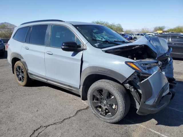 Photo 4 from auction – 2022 HONDA PILOT TRAI with VIN 5FNYF6H8XNB090023