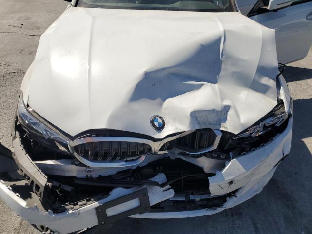 Photo 11 from auction – 2023 BMW 330I with VIN 3MW69FF03P8D40380