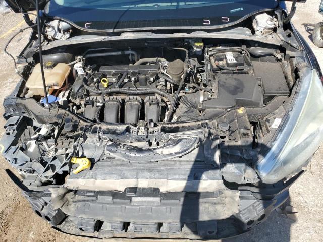 Photo 11 from auction – 2015 FORD FOCUS SE with VIN 1FADP3F2XFL287500